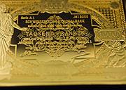 Eine goldene Notenprägung im Nominalwert von 1000 Franken